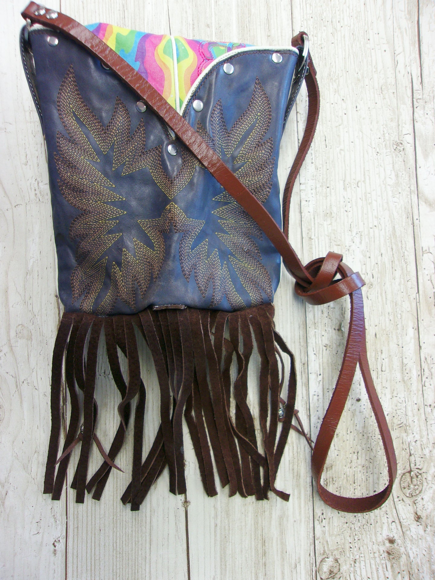 Small Cowboy Boot Purse with Fringe sm182 handcrafted from cowboy boots. Shop all unique leather western handbags, purses and totes at Chris Thompson Bags
